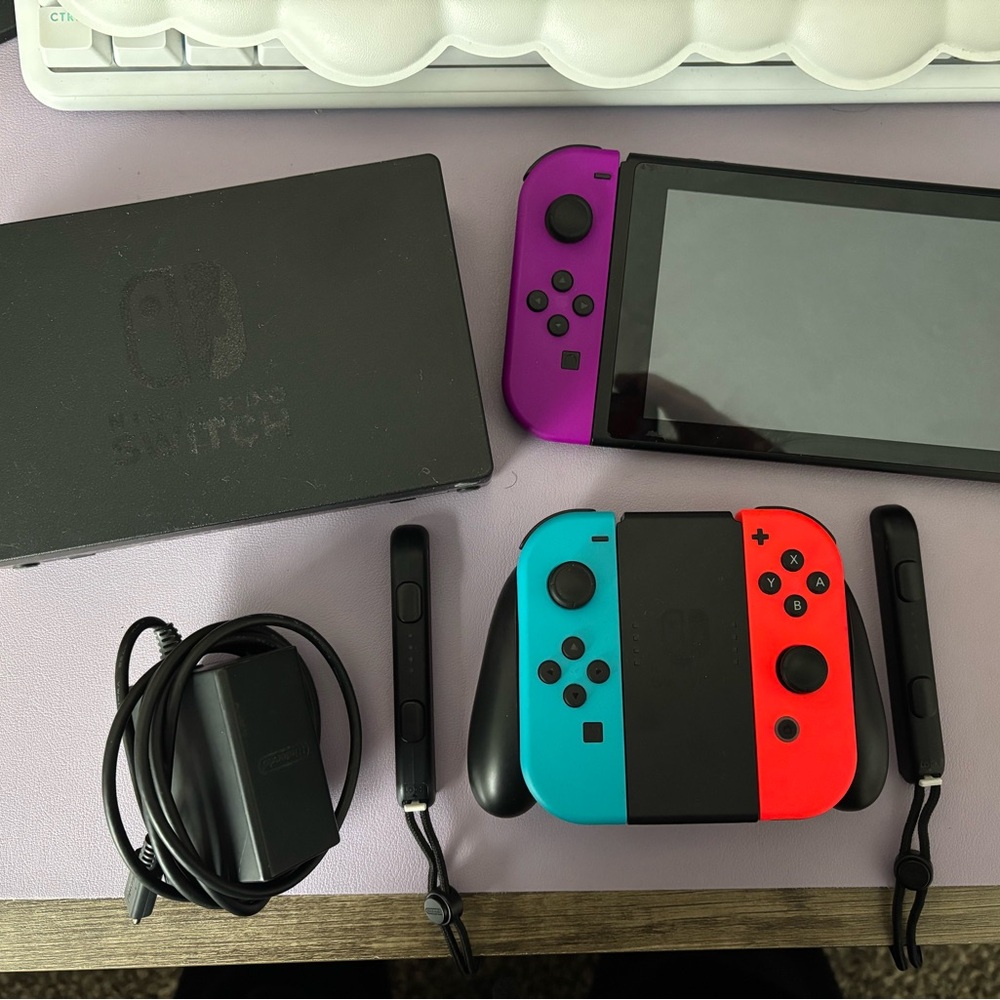 Nintendo Switch Console with Neon Blue and Purple Joy-Con